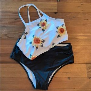Sunflower top and black bottom swimsuit
